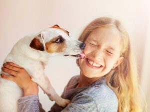 what does it mean when dogs lick your eyes