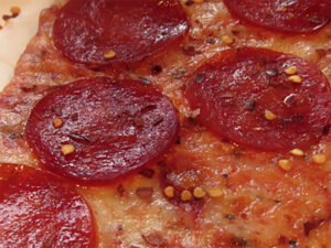 is pepperoni dangerous for dogs